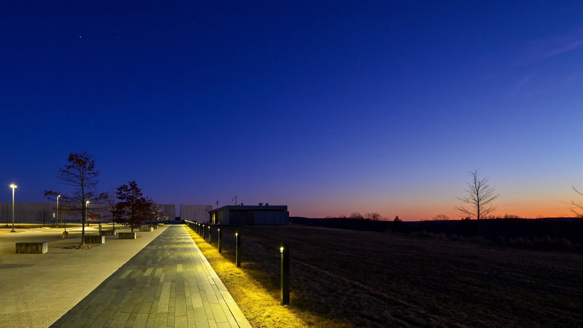Flight path lit up at dusk.